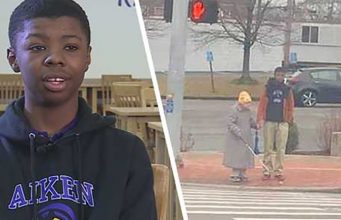 Photo shows teen helping elderly blind woman cross the street and I think he deserves our recognition